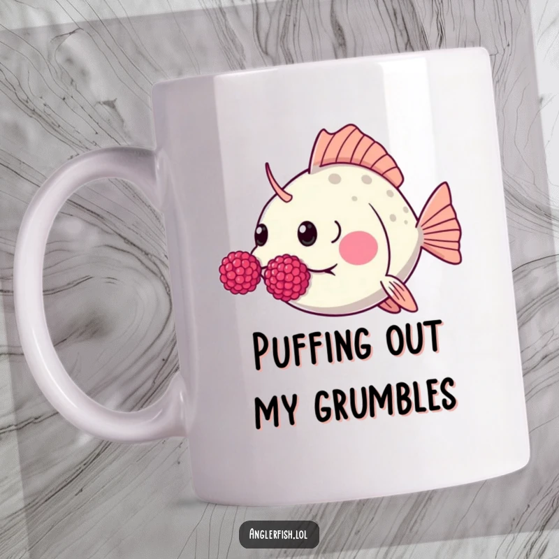 Funny Kawaii anglerfish mug showing a cute anglerfish humorously blowing raspberries with exaggeratedly puffed cheeks.