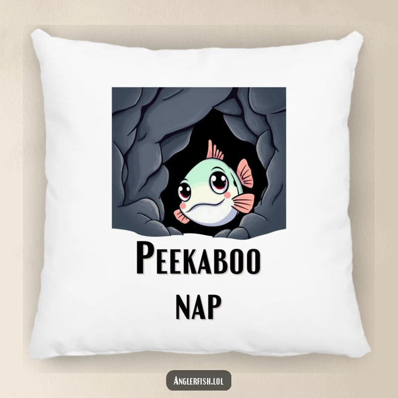 Funny anglerfish pillow showing a curious creature peeking from a dark cave, offering comfort and a humorous touch to any room.
