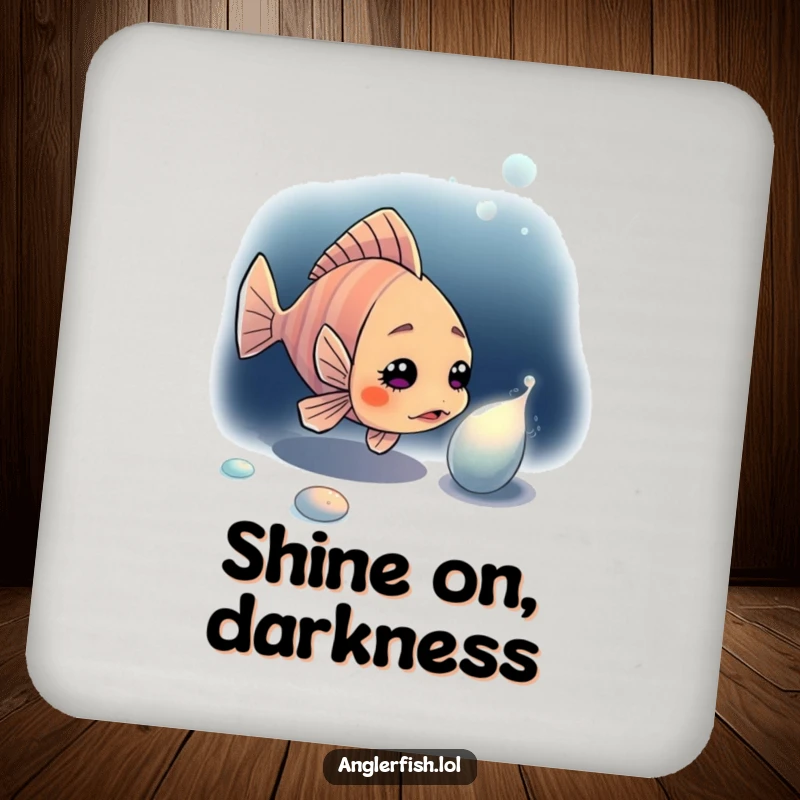 Funny anglerfish coaster depicting a curious anglerfish investigating a shiny object in the dark depths of the ocean.