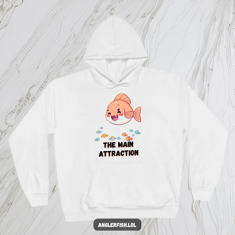 Funny hoodie featuring a delighted anglerfish casting its light onto a happy audience of tiny fish, embodying warmth and joy.