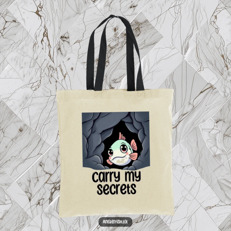 Funny anglerfish tote bag showing a curious creature peeking from a dark cave, a practical and humorous accessory for daily use.