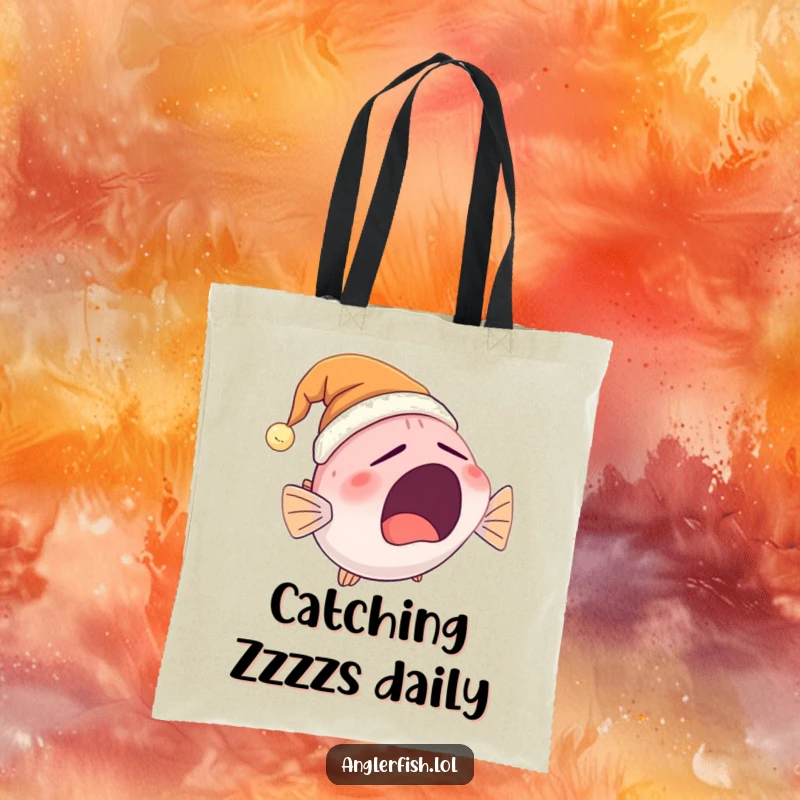 Funny Anglerfish Tote Bag with a cute, yawning anglerfish wearing a glowing nightcap, ideal for carrying items with a humorous touch.