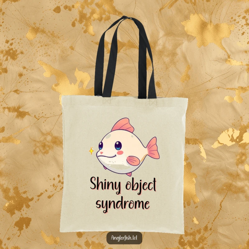 Funny kawaii anglerfish tote bag, playfully chasing a tiny shimmering spark, a stylish and funny gift for shoppers.